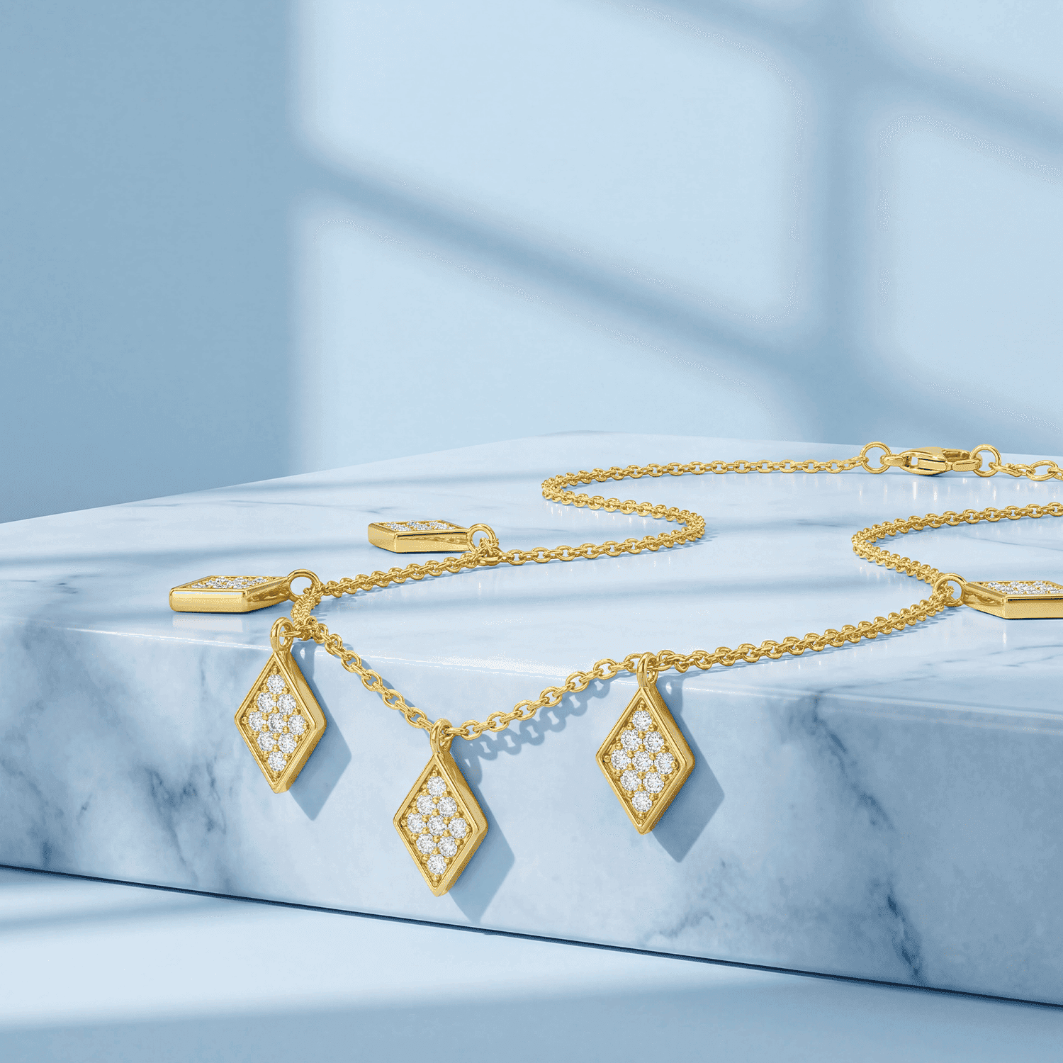 GOLD CHAINS WITH PENDANT AND CHARM DESIGNS